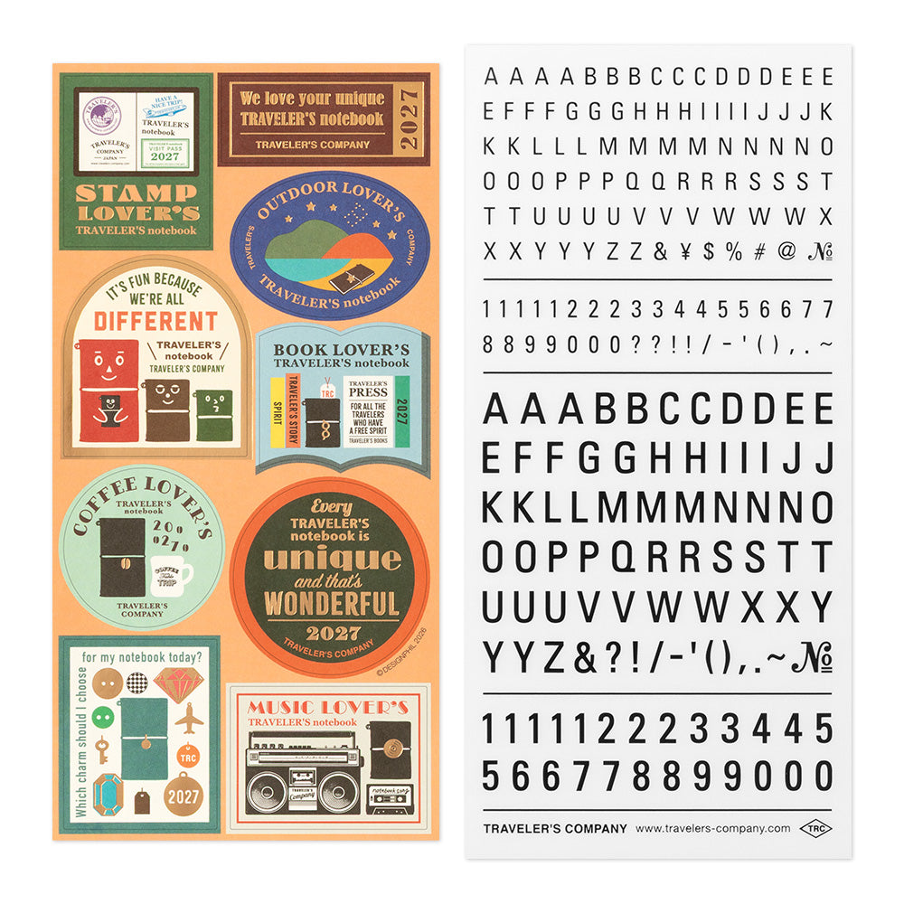 A sheet of decorative travel-themed stickers on the left and a matching stencil of letters and numbers on the right, branded Traveler's Company.