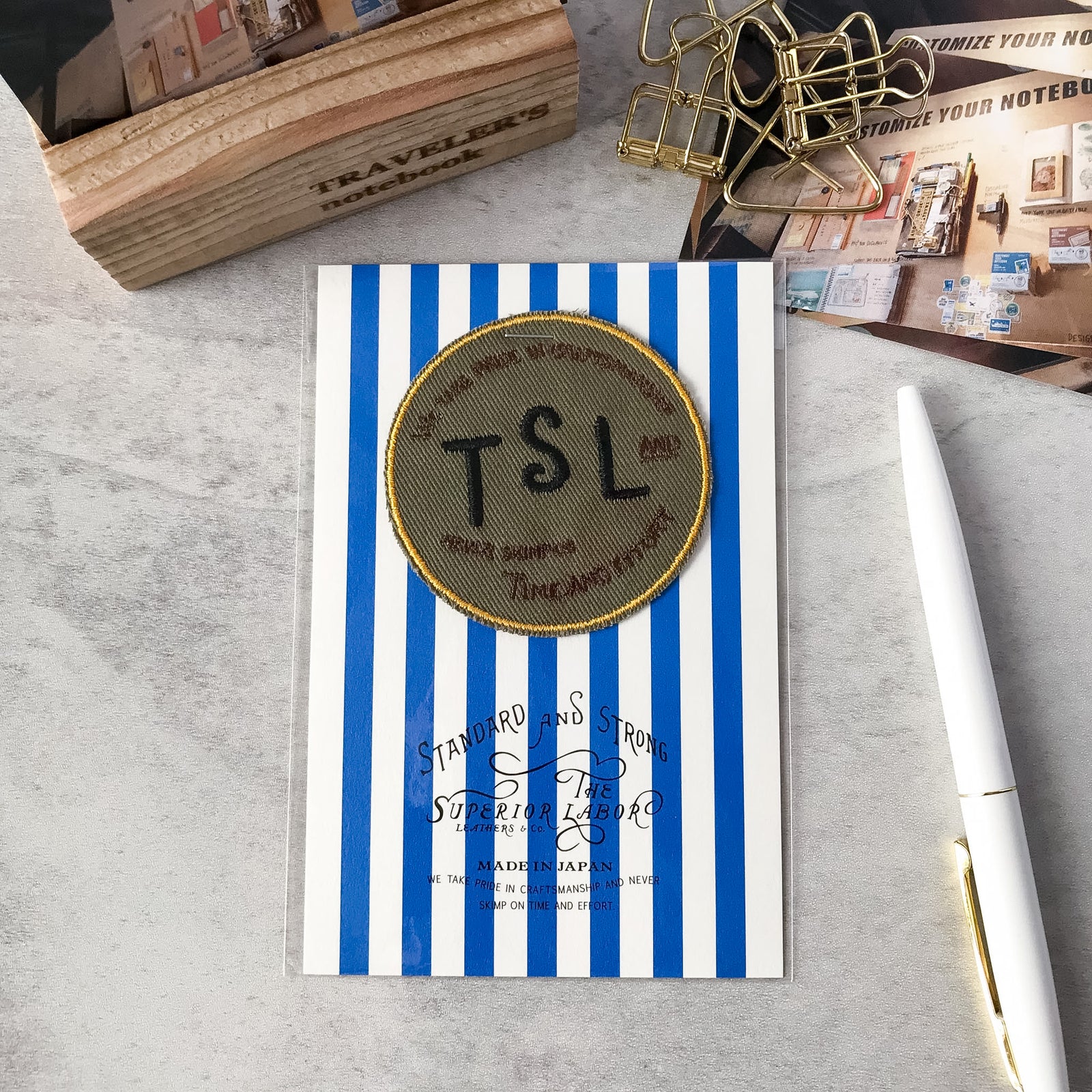 The Superior Labor Traveler's Factory: The Superior Labor TSL Patch Circle Khaki hero shot