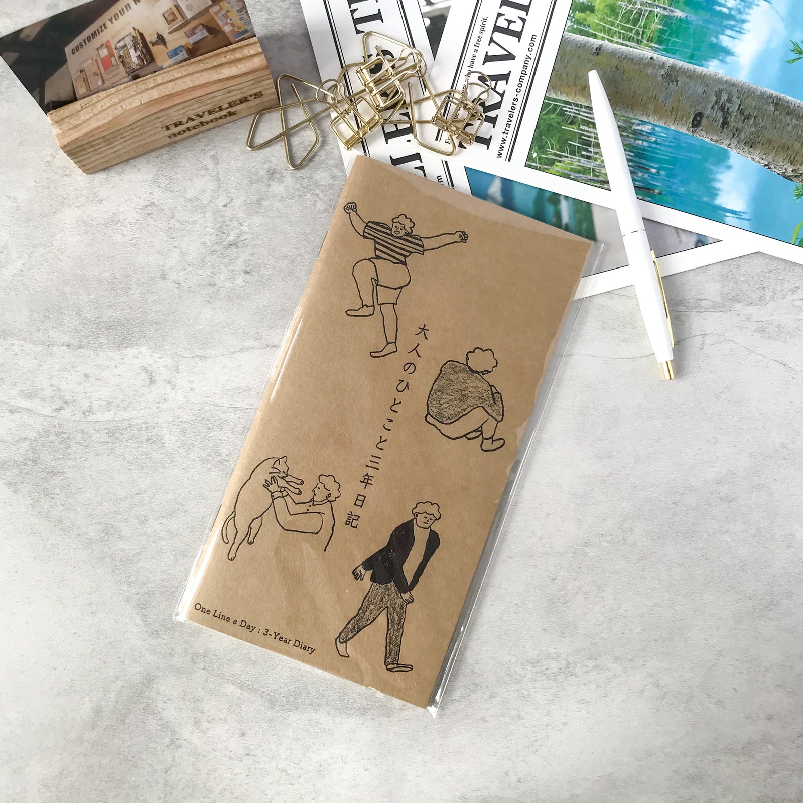 Packaged Traveler's Factory Mizushima 3-year diary insert displayed with promotional stationery elements.