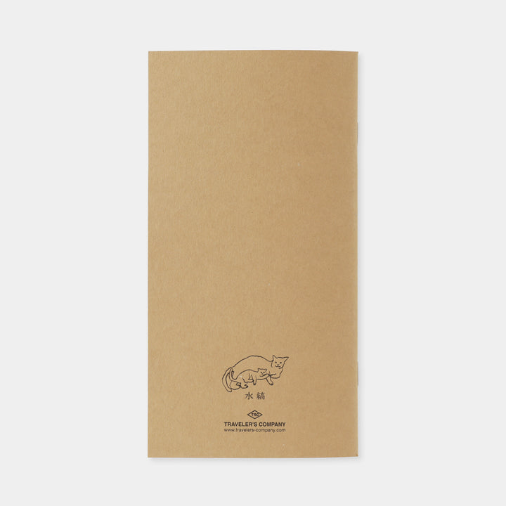 Back view showing the stitched binding and minimalist cream paper design of the Traveler&