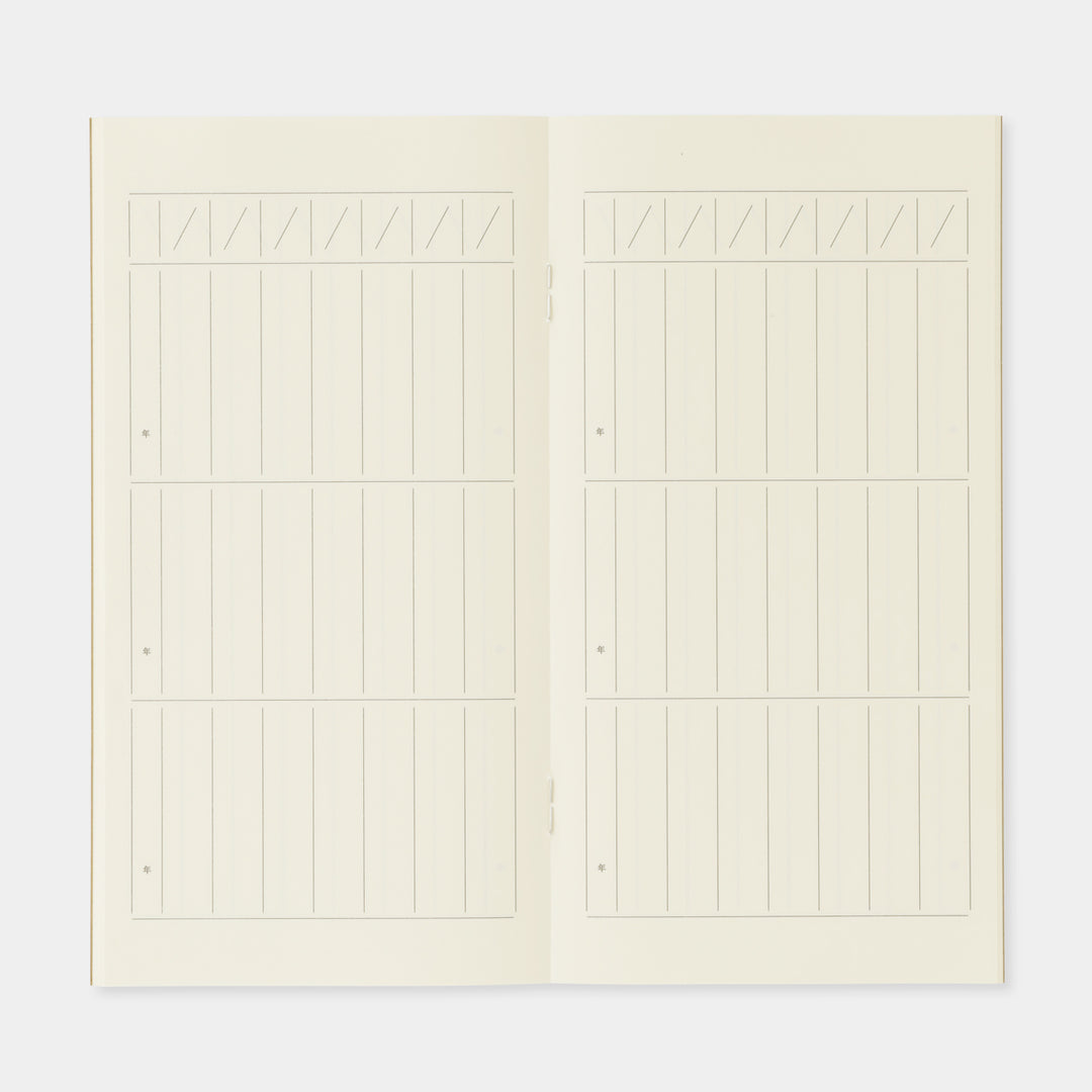 Close-up of the daily entry blocks and grid lines on premium cream Midori MD paper.