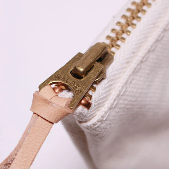 Close-up detail of the durable cotton canvas and hand-painted leather on The Superior Labor Engineer Pouch 